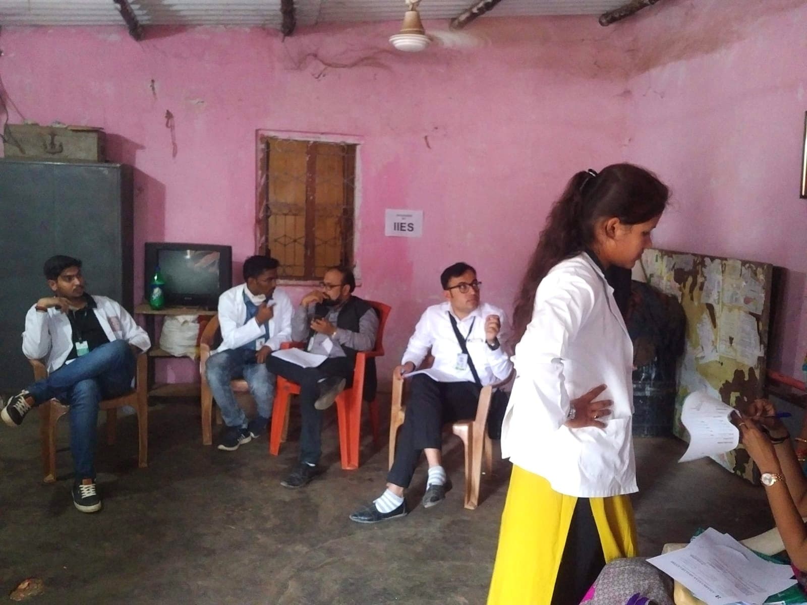 An IIES health camp under way in a village meeting room